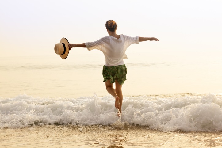 Female enjoying herself at the beach