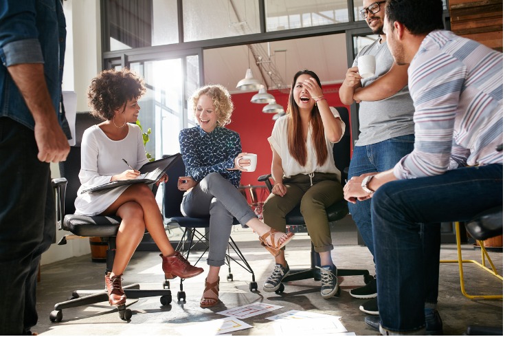 A group of employees taking part in a workplace wellbeing program