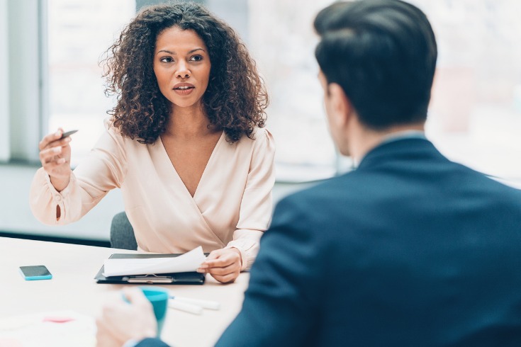 Employee underperforming at work and a manager confronting the problem. 