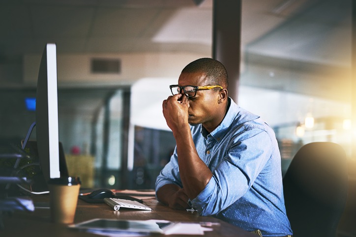 Office worker feeling stressed and burnt out 